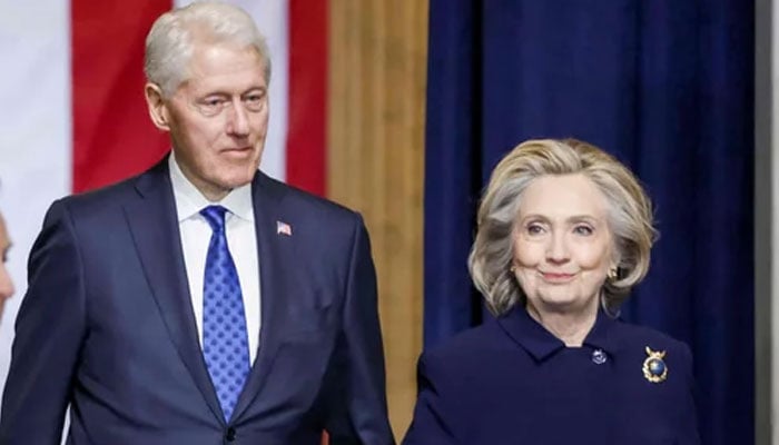 Former US president Bill Clinton (L) and former US Secretary of State Hillary Clinton. — AFP/File