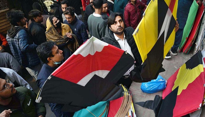 A large number of people selecting and purchasing the kites to celebrate the upcoming three-day kite flying festival (Basant) at local market in Lahore on February 2, 2026. — APP