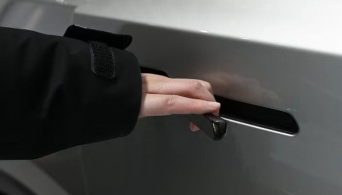 Why does China ban hidden door handles on EVs?