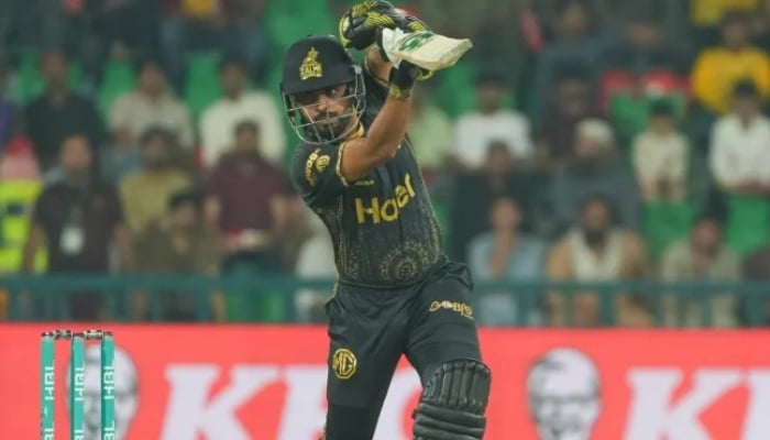 Peshawar Zalmi captain Babar Azam plays a shot during the Pakistan Super League (PSL) 10 match against Islamabad United at the Gaddafi stadium in Lahore on May 02, 2025. — PCB