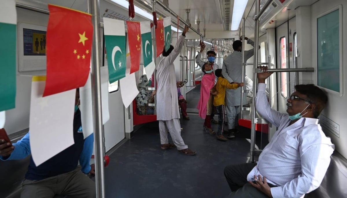 Passengers are seated in a Lahore metro project in 2020 built under the banner of the China-Pakistan Economic Corridor. — AFP/File
