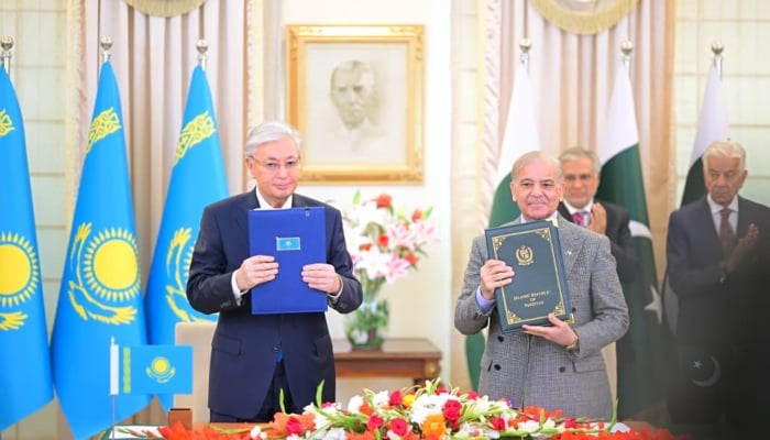 Prime Minister Shehbaz Sharif (right) and Kazakhstan President Kassym-Jomart Tokayev exchange Joint Declaration on Strategic Partnership between Pakistan and Kazakhstan at Prime Minister House, Islamabad, February 4, 2026. — X/ @GovtofPakistan