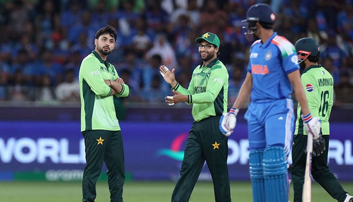 Pakistans Abrar Ahmed (left) celebrates dismissing Indias Shubman Gill during their ICC Mens Champions Trophy 2025 match at the Dubai International Cricket Stadium in Dubai on February 23, 2025. — Reuters