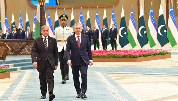 Prime Minister Shehbaz Sharif (left) and Uzbekistan President Shavkat Mirziyoyev are pictured at the Congress Centre in Tashkent, Uzbekistan, on February 26, 2025. — PID
