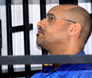 Libya's former leader Gaddafi's son Saif killed by 'four-man commando', confirms lawyer 
