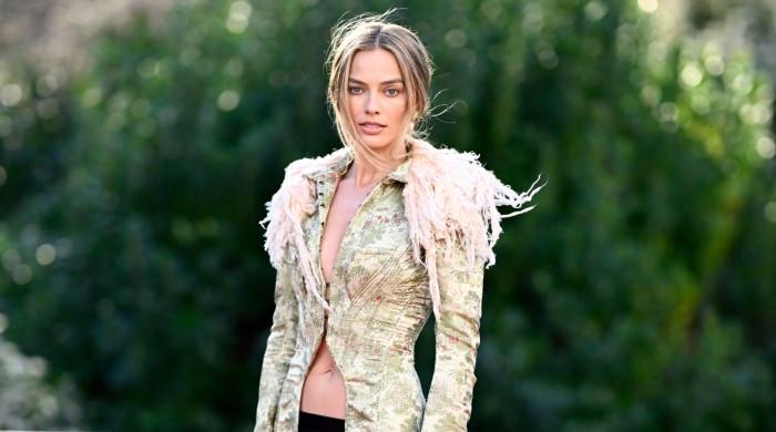 Margot Robbie steps out to promote upcoming movie in chic style 