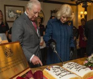 Queen Camilla 'scolds' King Charles during cake cutting