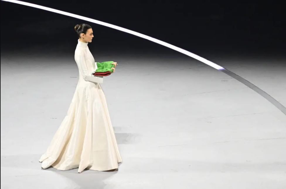 Vittoria Ceretti dazzles in white gown at Winter Olympics opening ceremony