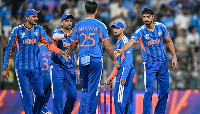 Indias Arshdeep Singh (R) celebrates with teammates Suryakumar Yadav (2L), Axar Patel (L) and Shivam Dube (C) after taking the wicket of USAs captain Monank Patel during the 2026 ICC Mens T20 Cricket World Cup group stage match between India and USA at the Wankhede Stadium in Mumbai on February 7, 2026. — AFP