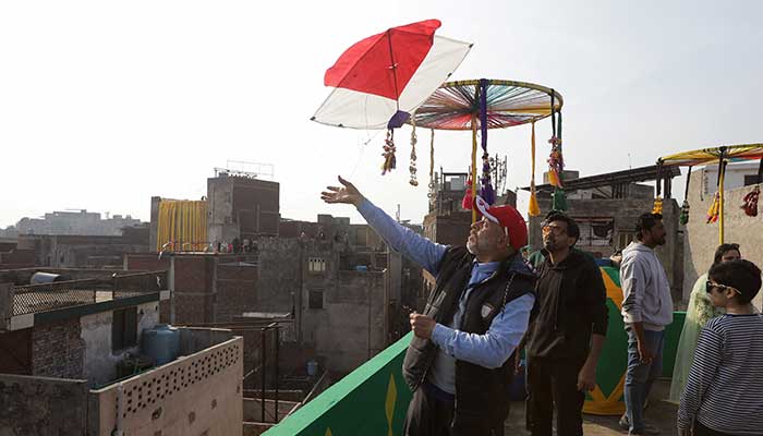 A man flies a kite from a rooftop to mark Basant, a kite-flying festival, in Lahore on February 6, 2026. — Reuters