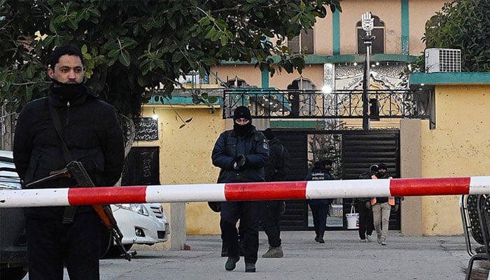 Police stand guard at the scene a day after the suicide bombing of a mosque in Islamabad on February 7, 2026. — AFP