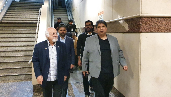PCB spokesperson Amir Mir (right) welcomes ICC deputy chairman Imran Khwaja upon his arrival in Lahore, February 8, 2026. — X/Amir Mir