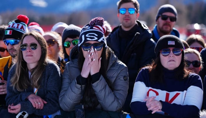 Fans react after Lindsey Vonn of the United States crashed during the womens downhill. — Reuters