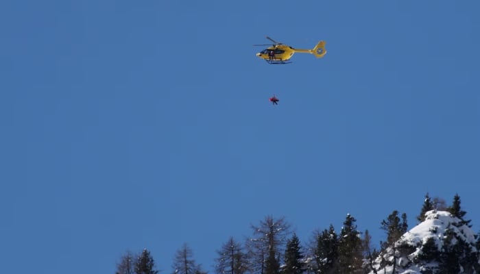 General view of a helicopter after Lindsey Vonn of United States crashed during the womens downhill, Milano Cortina 2026 Olympics, Alpine Skiing, Womens Downhill, Tofane Alpine Skiing Centre, Belluno, Italy, February 08, 2026. — Reuters