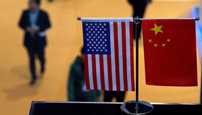 This undated photo shows flag of the United States and China. — AFP/File