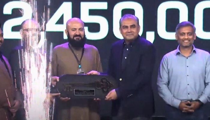 PCB chief Mohsin Naqvi (second from right) hands the celebratory key to the winning bidder of the auction for Pakistan Super League (PSL) franchise Multan Sultans in Lahore, Punjab, February 9, 2026. — Screengrab via YouTube/Geo News