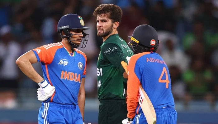 Shaheen Shah Afridi of Pakistan speaks to Abhishek Sharma and Shubman Gill during the Asia cup match against India at Dubai International Stadium on September 21, 2025 in Dubai, United Arab Emirates. — AFP