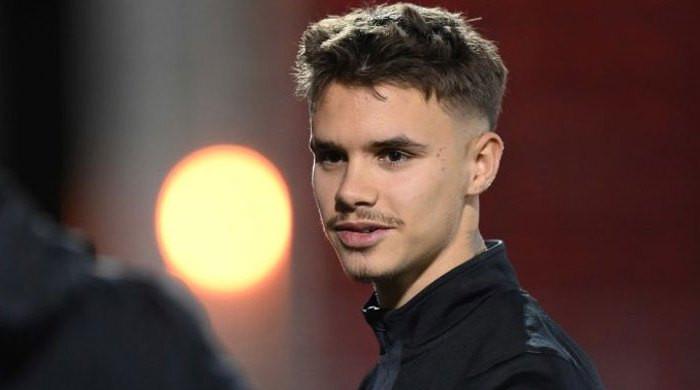 Romeo Beckham showsoff new ‘family' tattoo amid Brooklyn turmoil