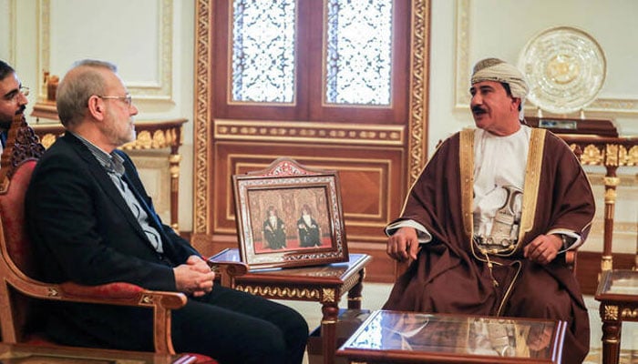 Secretary of the National Security Council, Ali Larijani, meets with the Minister of the Royal Office in the Sultanate of Oman, Sultan bin Mohammed al Numani, in Muscat, Oman, February 10, 2026. — Reuters