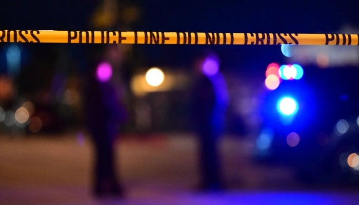 Representational image shows police tape at the scene of a shooting. — AFP