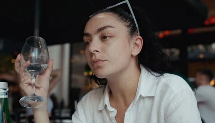 Charli XCX ditches punk glam in first look at ‘Erupcja’