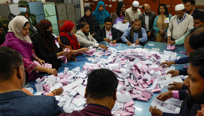 Electoral workers sort the ballots before counting the votes, during the 13th general election in Dhaka, Bangladesh, February 12, 2026. — Reuters