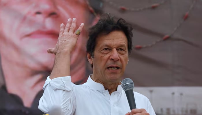 Imran Khan, founder of Pakistan Tehreek-e-Insaf (PTI), gestures while addressing his supporters during a campaign meeting ahead of general elections in Karachi, July 4, 2018. — Reuters