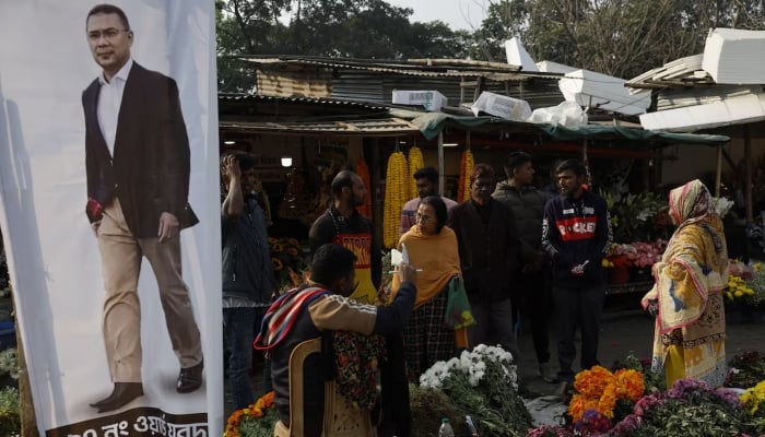 A banner with a photo of Bangladesh Nationalist Party (BNP) chairman Tarique Rahman, is placed in a flower market, following the 13th general election, in Dhaka, Bangladesh, February 13, 2026. — Reuters