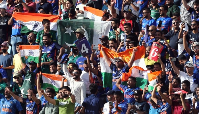 Pakistan and India fans are pictured with flags inside the stadium before the match, Dubai International Stadium, Dubai, United Arab Emirates, August 28, 2022. — Reuters