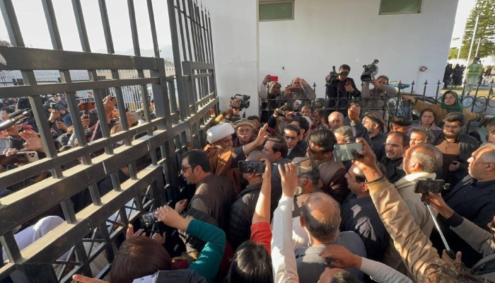 Opposition leaders arrive outside the Parliament House for a sit-in, over concerns regarding PTI founder Imran Khans health in Adiala jail, in Islamabad, February 13, 2026. — Screengrab via X/@MKAchakzaiPKMAP
