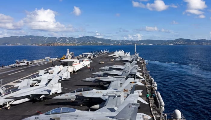 The worlds largest aircraft carrier, the US Navy nuclear-powered Ford-class aircraft carrier USS Gerald R Ford arrives in St. Thomas, US Virgin Islands, December 1, 2025. — Reuters