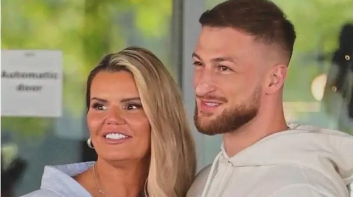 Kerry Katona enjoys romantic beach stroll with boyfriend Paolo in Dubai