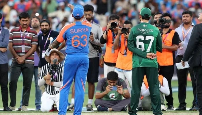 Indias Suryakumar Yadav and Pakistans Salman Ali Agha during the coin toss at Asia Cup match on September 14, 2025. — Reuters