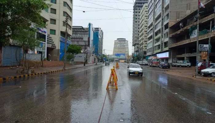 The picture shows II Chundrigar Road in Karachi following rainfall on April 14, 2024. — Geo.tv