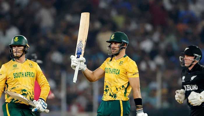 South Africas Aiden Markram (centre) celebrates scoring a half-century during their ICC Mens T20 World Cup match against New Zealand at the Narendra Modi Stadium in Ahmedabad on February 14, 2026. — ICC