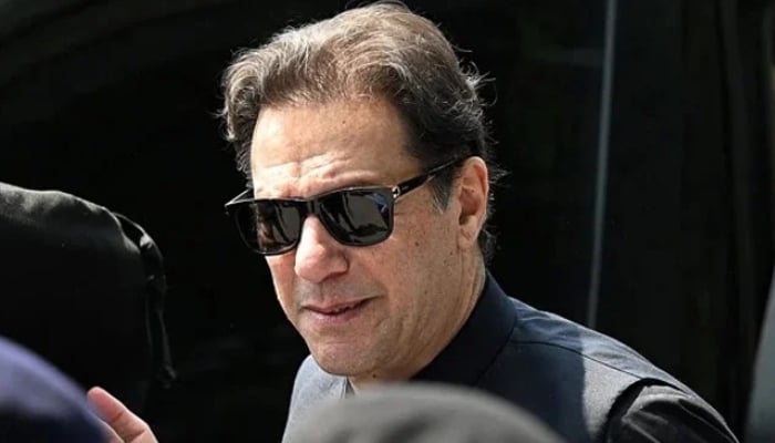 PTI founder Imran Khan arrives to appear in the Supreme Court in Islamabad on July 24, 2023. — AFP