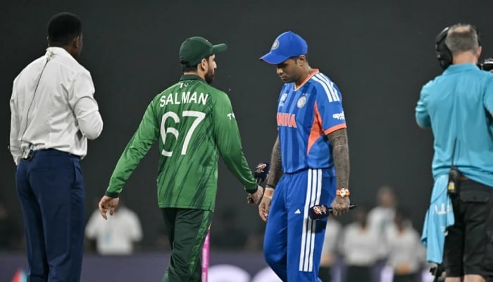 Pakistan skipper Salman Agha (second from left) and Indian captain Surya Kumar Yadav at the toss before their ICC Mens T20 World Cup encounter at R Premadasa Stadium in Colombo, Sri Lanka, February 15, 2026. — AFP