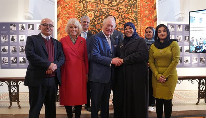 King Charles puts his touch on mother of pearl, leaving artisan proud