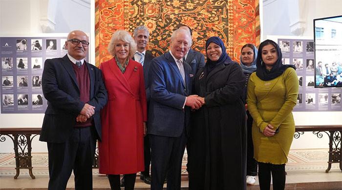 King Charles puts his touch on mother of pearl, leaving artisan 'proud'