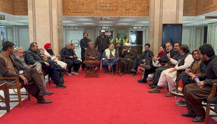 NA Opposition Leader Mehmood Khan Achakzai and Senate Opposition Leader Allama Raja Nasir Abbas pictured  during a sit-in along with other lawmakers inside the Parliament House on February 16, 2026. — PTI