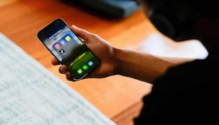 A representational image shows social media applications on a mobile phone. — Reuters/File