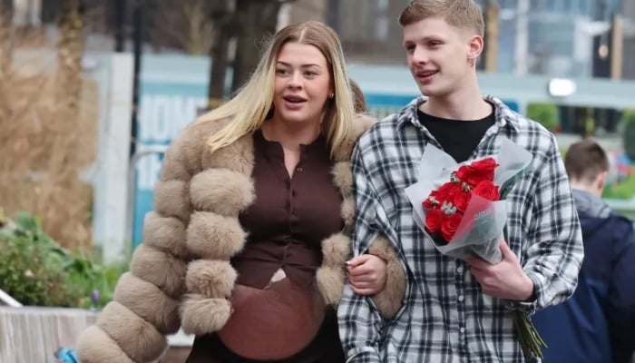 Freddy Brazier packed on the PDA during a romantic stroll on Saturday