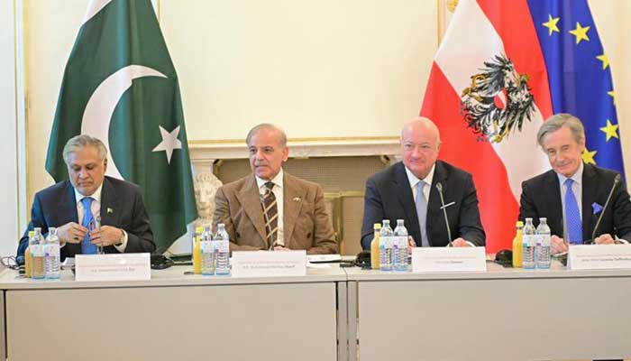 Prime Minister Shehbaz Sharif and Austrian Chancellor Christian Stocker in a meeting with Pakistani and Austrian companies in Vienna on February 16, 2026. — PID