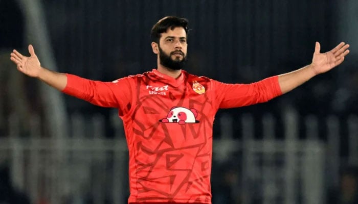Imad Wasim celebrates after taking the wicket of Karachi Kings Shoaib Malik during the Pakistan Super League (PSL) Twenty20 cricket match between Karachi Kings and Islamabad United at the Rawalpindi Cricket Stadium in Rawalpindi on March 7, 2024. — AFP