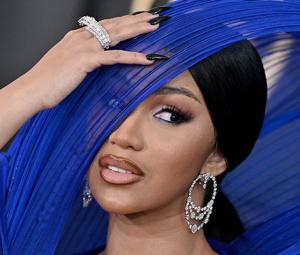 Cardi B flaunts tattoos after onstage fall during Little Miss drama tour