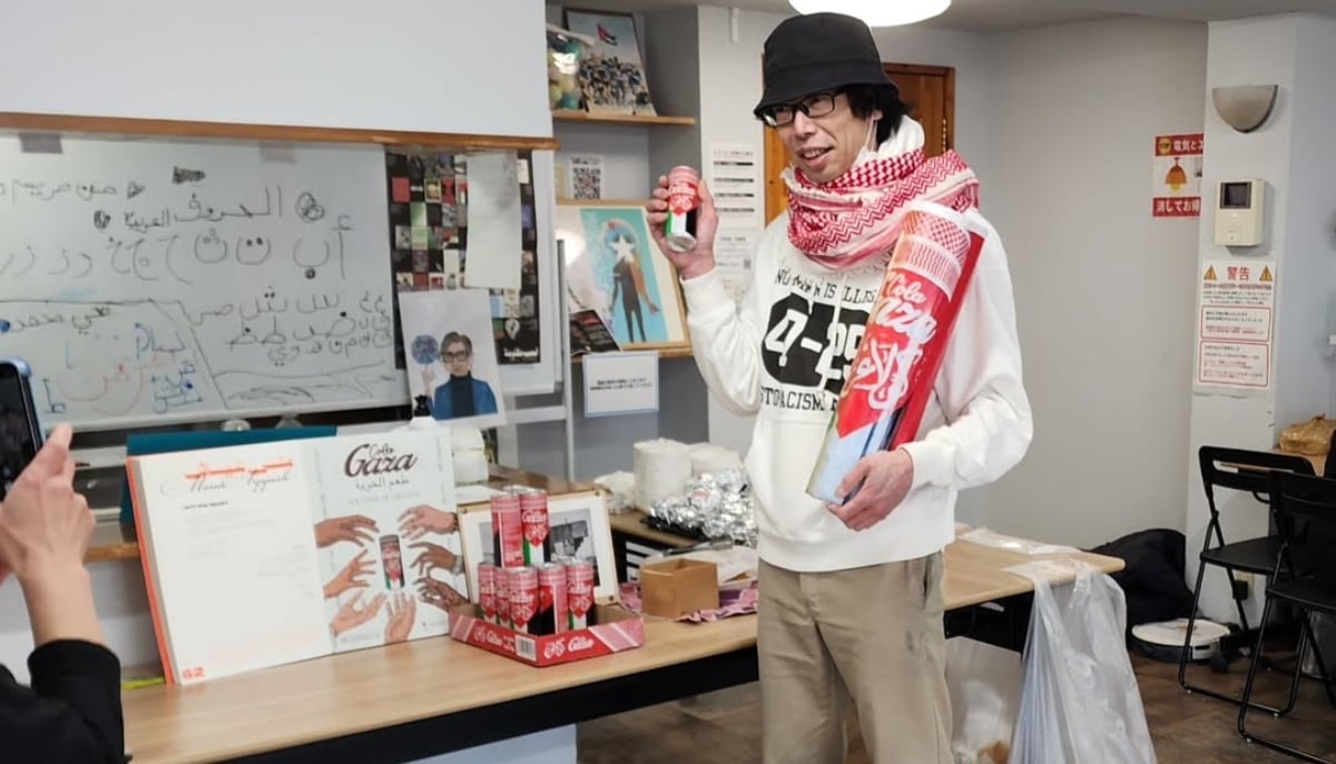 Japanese peace activist Yusuke Furusawa is seen wearing a red-coloured keffiyeh scarf. — Instagram/@furusawayusuke_