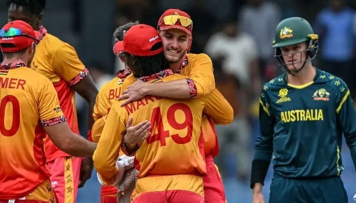 Zimbabwe’s Brian Bennett celebrates with teammates after their team’s win in the 2026 ICC Men’s T20 Cricket World Cup group stage match between Australia and Zimbabwe at the R Premadasa Stadium in Colombo on February 13, 2026. —AFP