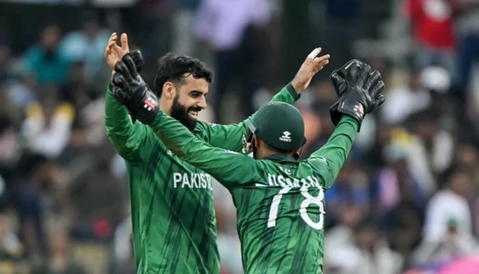 Pakistans Shadab Khan (left) celebrates a wicket with teammate Usman Khan during their ICC Mens T20 World Cup 2026 match against Namibia at the Sinhalese Sports Club (SSC) Ground, Colombo, February 18, 2026. — AFP