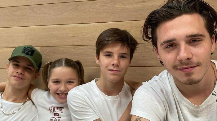Cruz Beckham proudly flaunts 'Harper's Brother' label in sweet snap