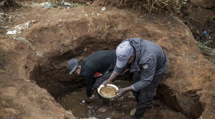 South African gold fever sparked as hundreds dig Johannesburg after man finds gold nuggets